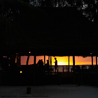 Buy canvas prints of Silhouette of a Beach Bar against a Romantic Sunset by Dietmar Rauscher