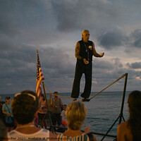 Buy canvas prints of Man on a tightrope juggling in Key West, Florida by Dietmar Rauscher