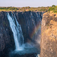 Buy canvas prints of Victoria Falls and Gorge with Rainbow by Dietmar Rauscher