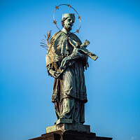 Buy canvas prints of Statue of Saint John of Nepomuk on Charles Bridge by Dietmar Rauscher