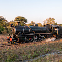 Buy canvas prints of Steam Train at Victoria Falls, Zimbabwe by Dietmar Rauscher