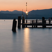 Buy canvas prints of Sirmione Ferry Terminal on Lake Garda Sunset by Dietmar Rauscher