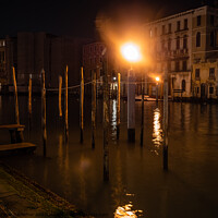 Buy canvas prints of Mooring Posts on Canal Grande, Venice, at Night by Dietmar Rauscher