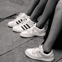 Buy canvas prints of Legs and Sneakers on the Street by Dietmar Rauscher
