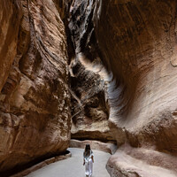Buy canvas prints of The Siq Gorge in the Nabatean City Petra with a Girl by Dietmar Rauscher