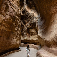 Buy canvas prints of The Siq Gorge in the Nabatean City Petra with a Girl by Dietmar Rauscher