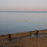 Buy canvas prints of Dead Sea Beach with Mud Buckets in Jordan by Dietmar Rauscher