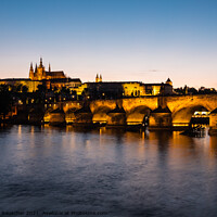 Buy canvas prints of Charles Bridge in Prague at Night,  Saint Vitus Cathedral at Dus by Dietmar Rauscher