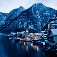 Buy canvas prints of Hallstatt Cityscape on a Winter Evening Covered with Snow by Dietmar Rauscher