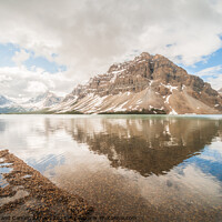 Buy canvas prints of Crowfoot Mountain Reflected in Bow Lake by Shawna and Damien Richard