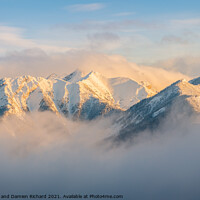 Buy canvas prints of Winter Rocky Mountain Ridges Shrouded in Mist by Shawna and Damien Richard