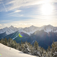 Buy canvas prints of Summit of Sulphur Mountain with sun flare by Shawna and Damien Richard