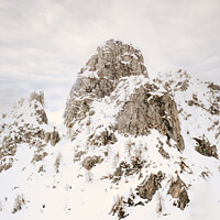 Buy canvas prints of Mountain rocky peak in the snow by Paolo Cordoni