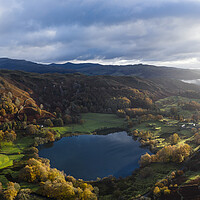 Buy canvas prints of Loughrigg Tarn in autumn in the Lake District by Sonny Ryse