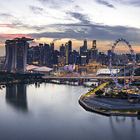 Buy canvas prints of Singapore Skyline at sunset aerial superwide by Sonny Ryse