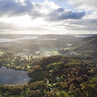 Buy canvas prints of Loughrigg Tarn and Elterwater aerial in autumn by Sonny Ryse