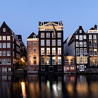 Buy canvas prints of Dancing houses at night amsterdam natherlands by Sonny Ryse