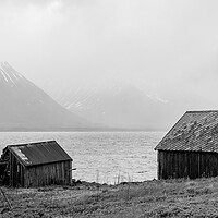 Buy canvas prints of Godfjorden Fjord Norwegian Huts Black and white Vesteralen by Sonny Ryse