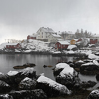 Buy canvas prints of Nusfjord fishing village cabins huts covered in snow Lofoten Isl by Sonny Ryse