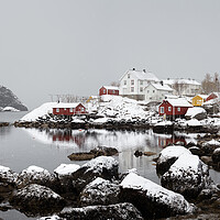 Buy canvas prints of Nusfjord fishing village cabins huts covered in snow Lofoten Isl by Sonny Ryse
