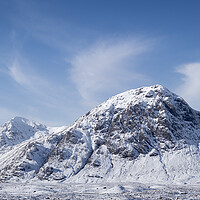 Buy canvas prints of Buachaille Etive Mòr Stob Dearg mountain covered in snow aerial in Glencoe Scotland by Sonny Ryse