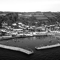 Buy canvas prints of Mousehole Fishing Village Harbour Aerial black and white by Sonny Ryse