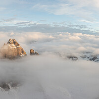 Buy canvas prints of Tre cime di lavaredo aerial above the clouds Italian Dolomites by Sonny Ryse