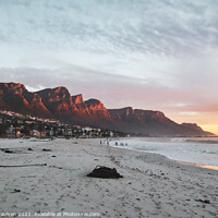 Buy canvas prints of Late afternoon sunset over Camps Bay beach  by Adrian Paulsen