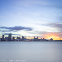 Buy canvas prints of The sun rising over the skyline of Liverpool by Paul Hanley