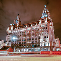 Buy canvas prints of Iconic Royal Liver Building lights up by Paul Hanley