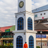 Buy canvas prints of Nam Phou Clocktower  by Margaret Ryan