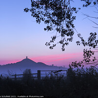 Buy canvas prints of Majestic Glastonbury Tor at Sunrise by Les Schofield