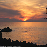 Buy canvas prints of Majestic Sunset over Ilfracombe by Les Schofield