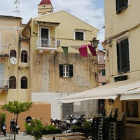 Buy canvas prints of Square in Corfu town  by Les Schofield