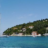 Buy canvas prints of Boats in harbour at Paxos Greece  by Les Schofield