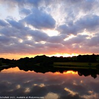 Buy canvas prints of Sunset reflection  by Les Schofield