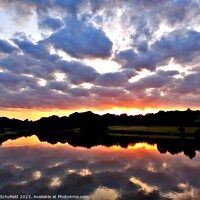 Buy canvas prints of Sunset and lake reflection  by Les Schofield