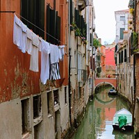 Buy canvas prints of Washing day in Venice  by Les Schofield