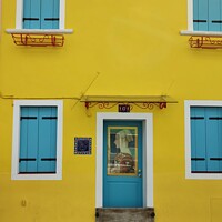 Buy canvas prints of Burano yellow house  by Les Schofield