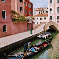 Buy canvas prints of Gondola on the Venice canal  by Les Schofield