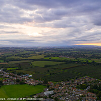 Buy canvas prints of Somerset's Stormy Sky Spectacle by Les Schofield