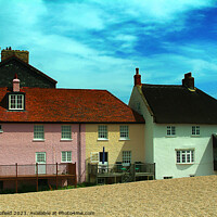 Buy canvas prints of West Bay Cottages on the Beach by Les Schofield
