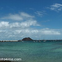 Buy canvas prints of Corralejo town  by Les Schofield
