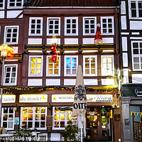 Buy canvas prints of Colourful Germany street by Les Schofield