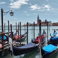 Buy canvas prints of Gondolas on the Venice canal  by Les Schofield