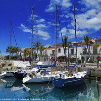 Buy canvas prints of Mogan Harbour Gran Canarias  by Les Schofield