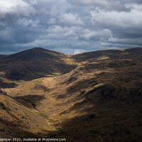 Buy canvas prints of Abundance of clouds above Middle Fell  by Adrian Gavigan