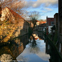 Buy canvas prints of Reflections of Brugge by Ron Ella