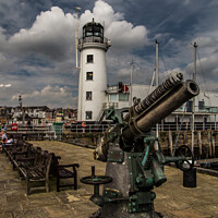 Buy canvas prints of Scarborough Harbour Lighthouse and Gun by Ron Ella