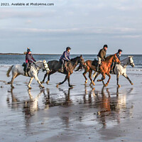 Buy canvas prints of Coastal Horseback Riders by Ron Ella
